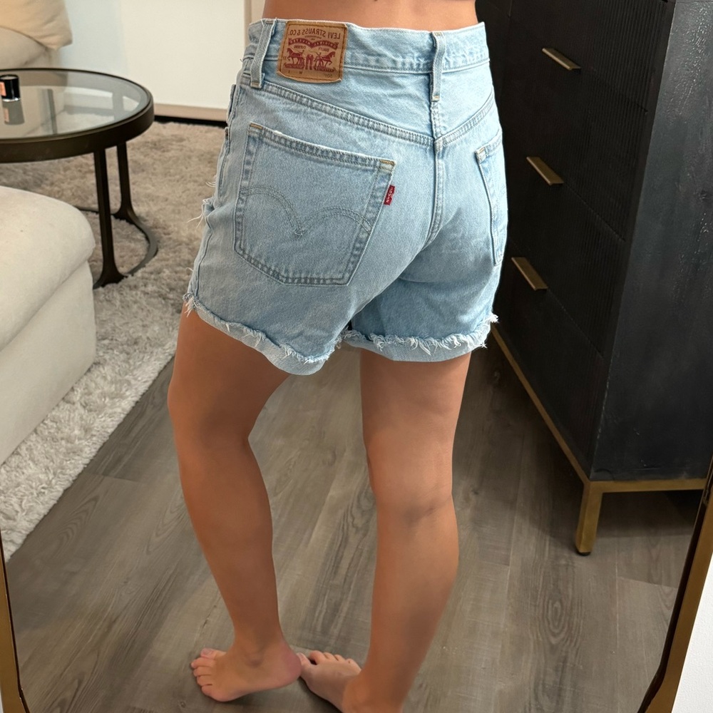 Vintage Levi's Light Blue Distressed Denim Shorts 27